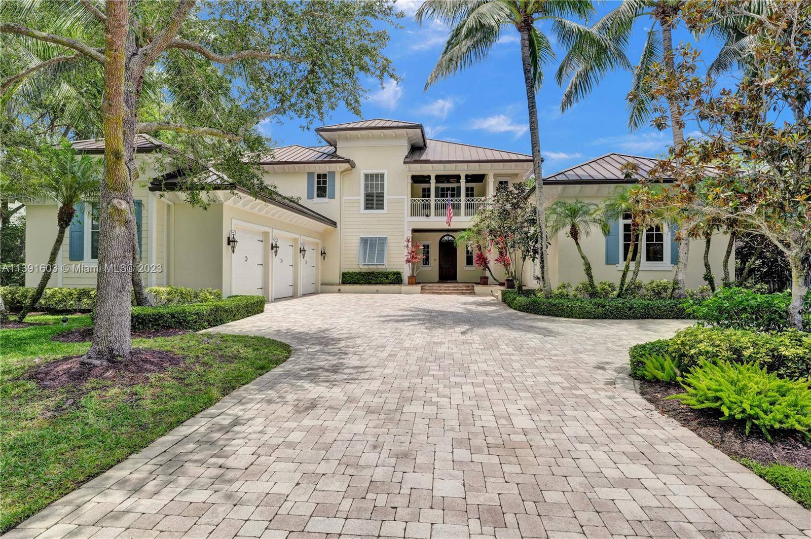 Masterfully designed nestled within prestigious Old Marsh Golf Club this exquisite custom residence showcases seamless indoor outdoor living with a blend of golf water views.