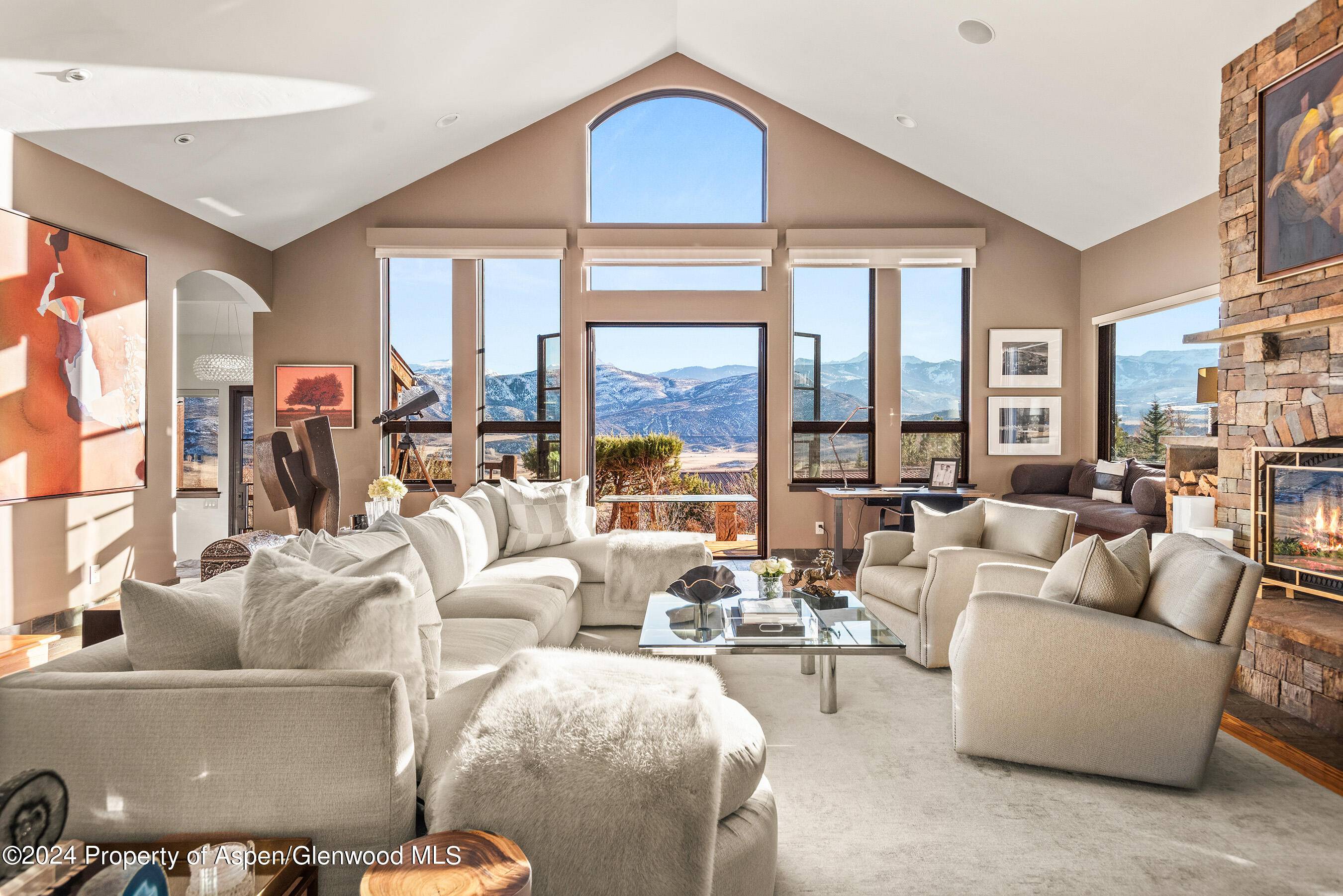 Look out at expansive views of snowcapped peaks and the entire Snowmass Creek Valley from this home's commanding perch in Old Snowmass.