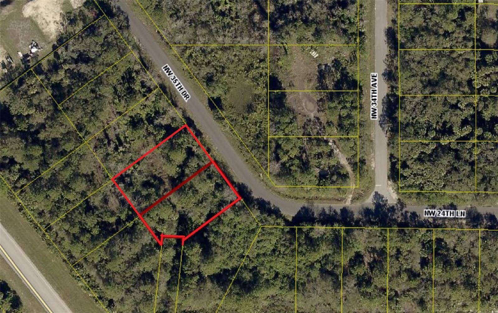 Half acre wooded residential lot in Basswood available, NOT in a flood zone.