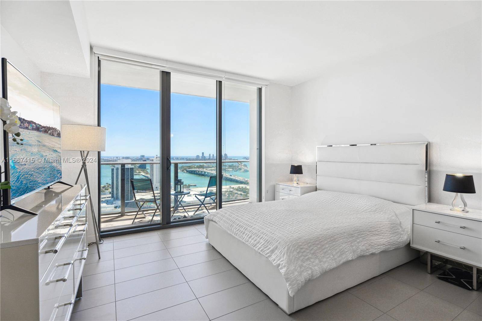 Situated in the heart of Miami's Arts Entertainment District, this high floor, turnkey, fully furnished residence offers panoramic views of Biscayne Bay, Miami Beach, Port of Miami, and the Miami ...