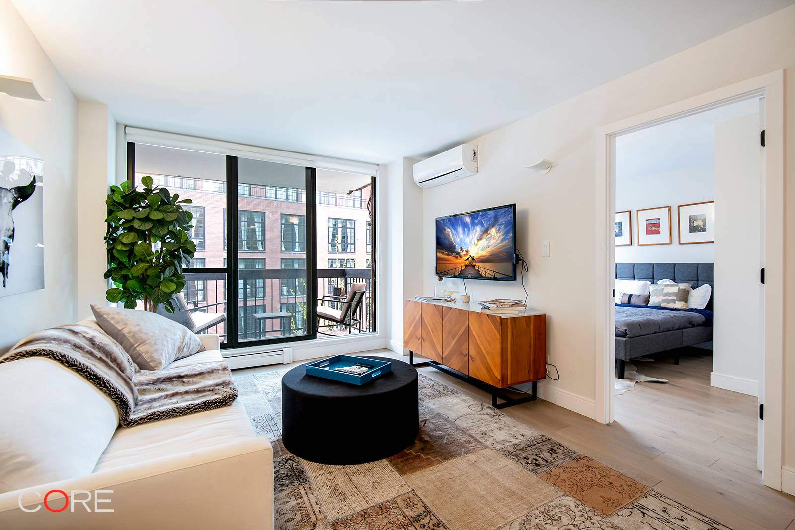 This gut renovated two bedroom, two bathroom home comes modernly furnished or unfurnished with a private balcony in one of the city's most trendy neighborhoods.