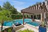 Hot tub with fire pit feature. Large enough for six but I prefer just two