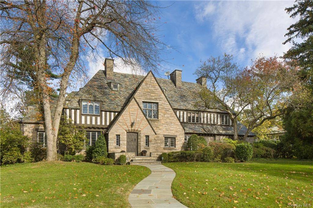 Now's the time to take a look at this light and airy English Country house designed by the acclaimed architect George Root in the renowned Bronxville School district.