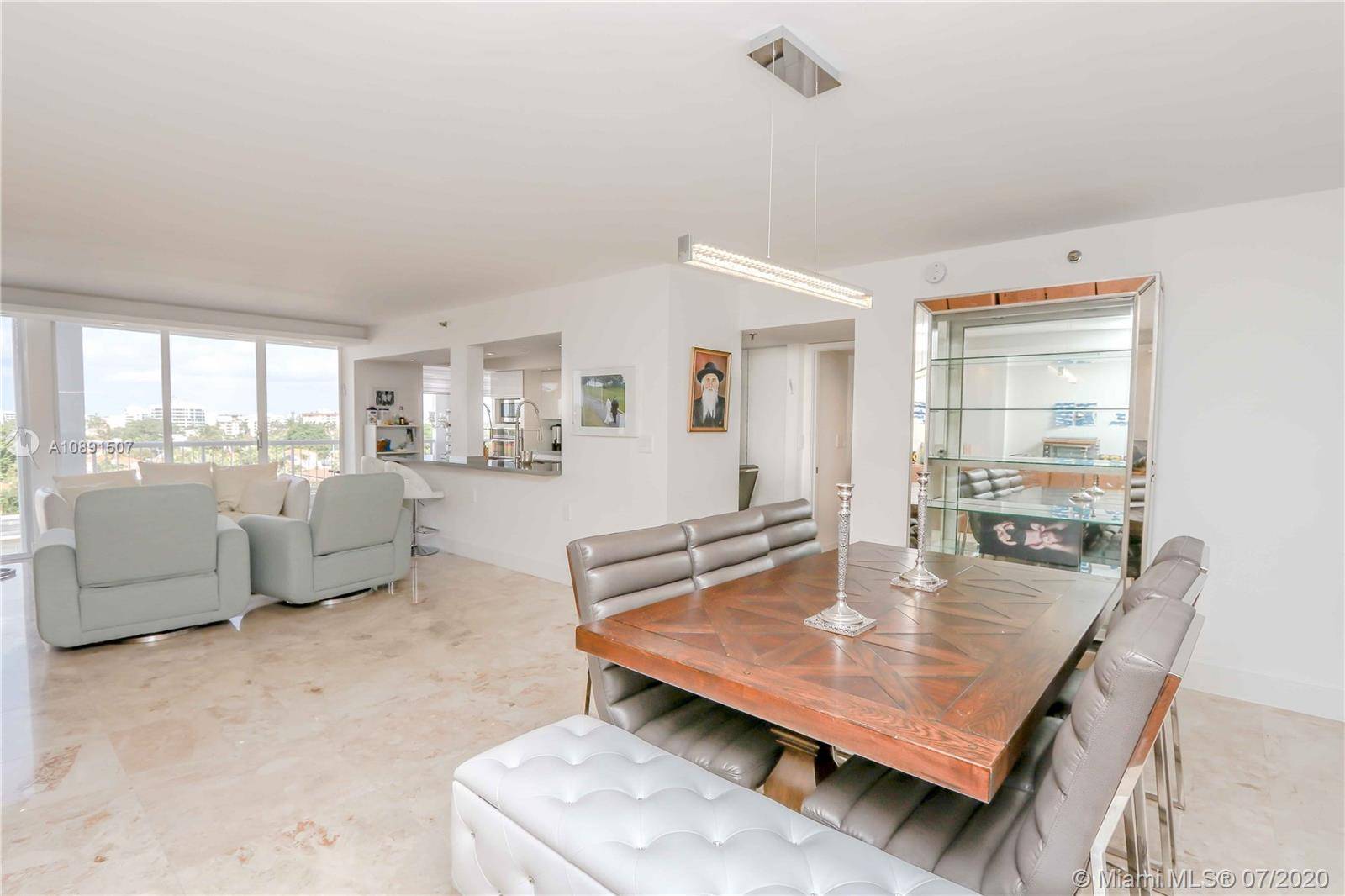 ON THE OCEAN, FULL RENOVATED 3 BEDROOM 2, 5 MARBLE BATHS, EXPANSIVE LIVING DINING ROOM OVERLOOKING FANTASTIC OVERSIZE WRAP AROUND BALCONY WITH CITY OCEAN VIEWS.