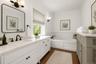 Staged -One of Two Primary Bathrooms