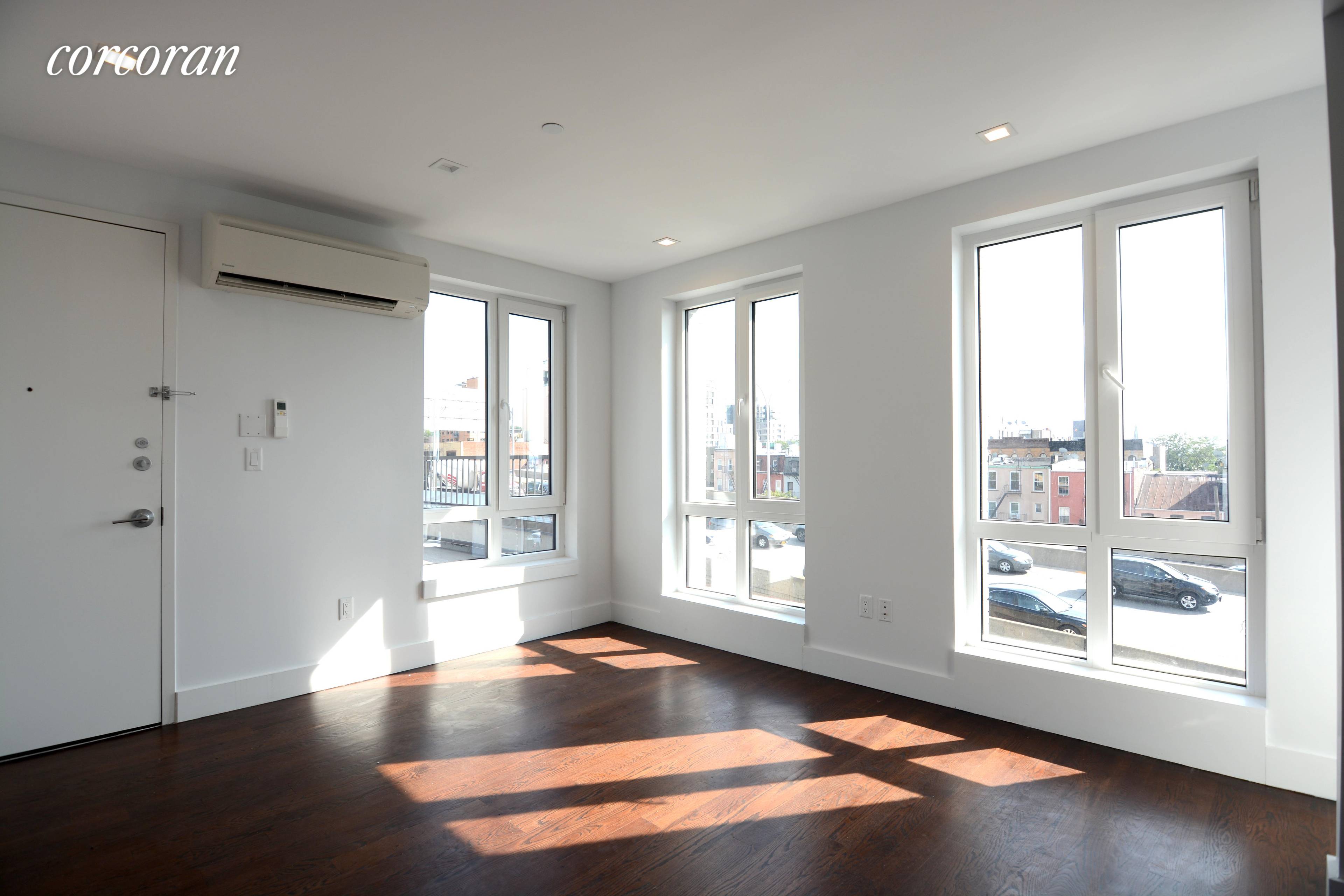 Modern sleek 3 Bedroom 2 Bathroom ApartmentShared Outdoor Space and Laundry In Building.
