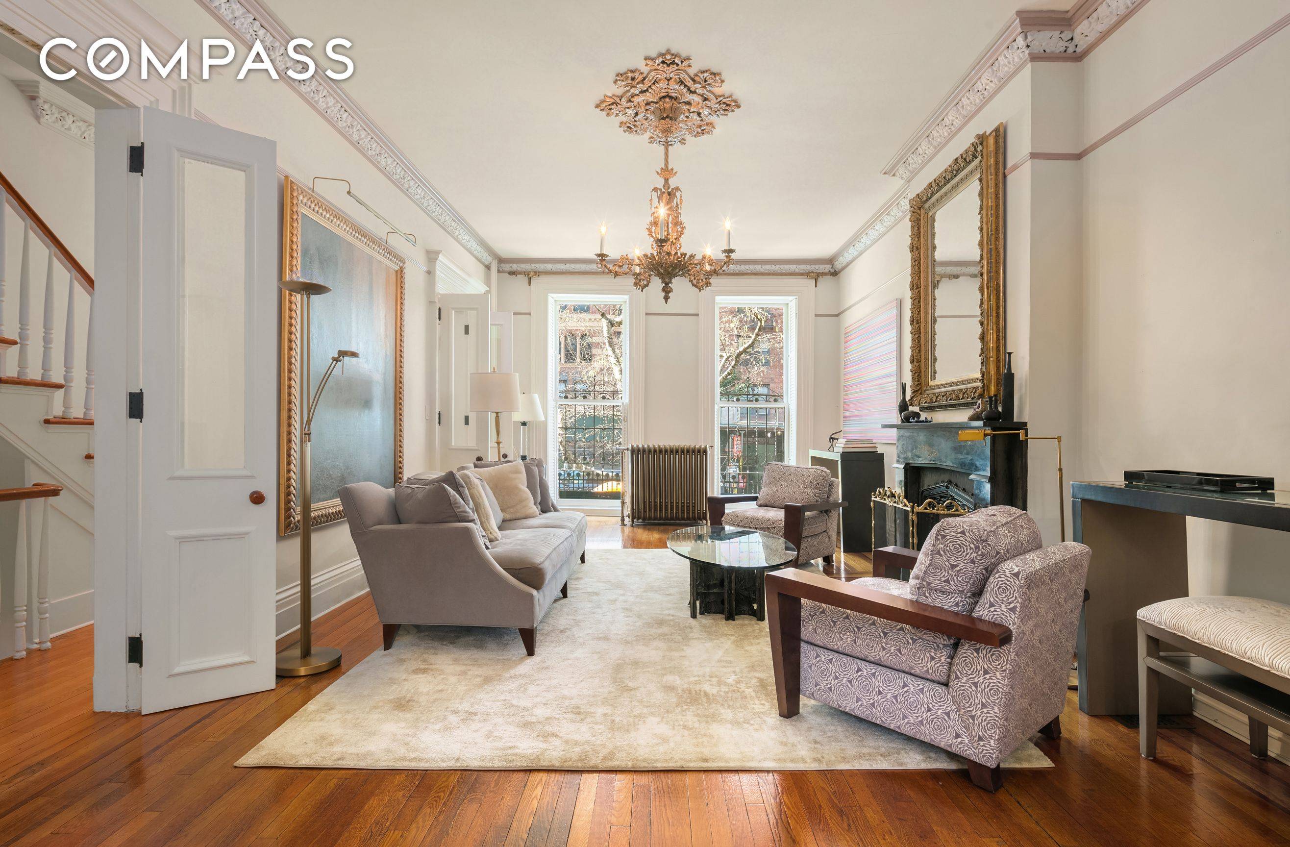 Set behind a rare and beautifully planted front garden, a historic stoop leads one up into the impeccably preserved interiors of this 21 foot wide, Greek Revival single family townhouse ...