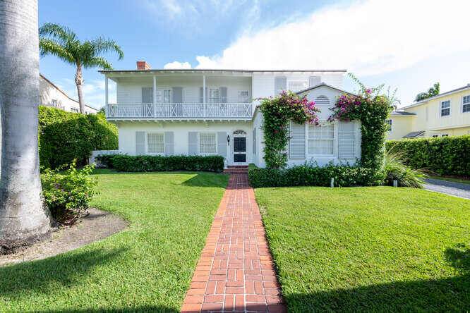 Gracious 2 story Monterey style House designed by Treanor and Fatio in 1936 located on one of the most prestigious midtown streets abutting the Breakers Golf Course with glorious golf ...