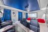 custom designed movie theater with 6 reclining chairs and 120" projector, and sound system.