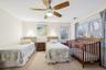 Carpeted bedroom 6 with ceiling fan