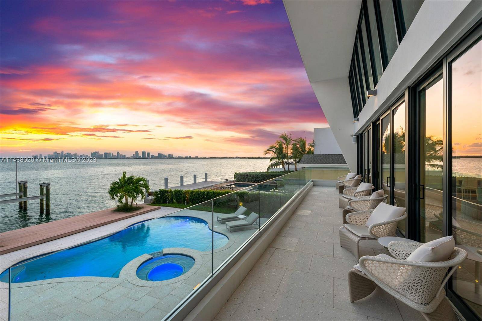 Located in a beautiful Biscayne Bay neighborhood, this designer decorated villa offers breathtaking sunrise and sunset views.