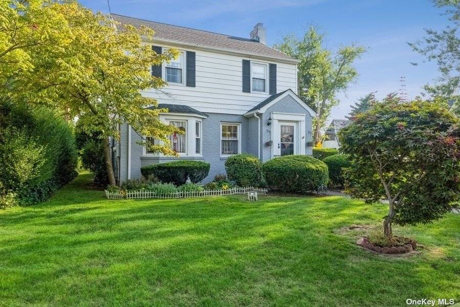 Welcome Home ! You will not want to miss this Spacious Colonial in Garden City South.