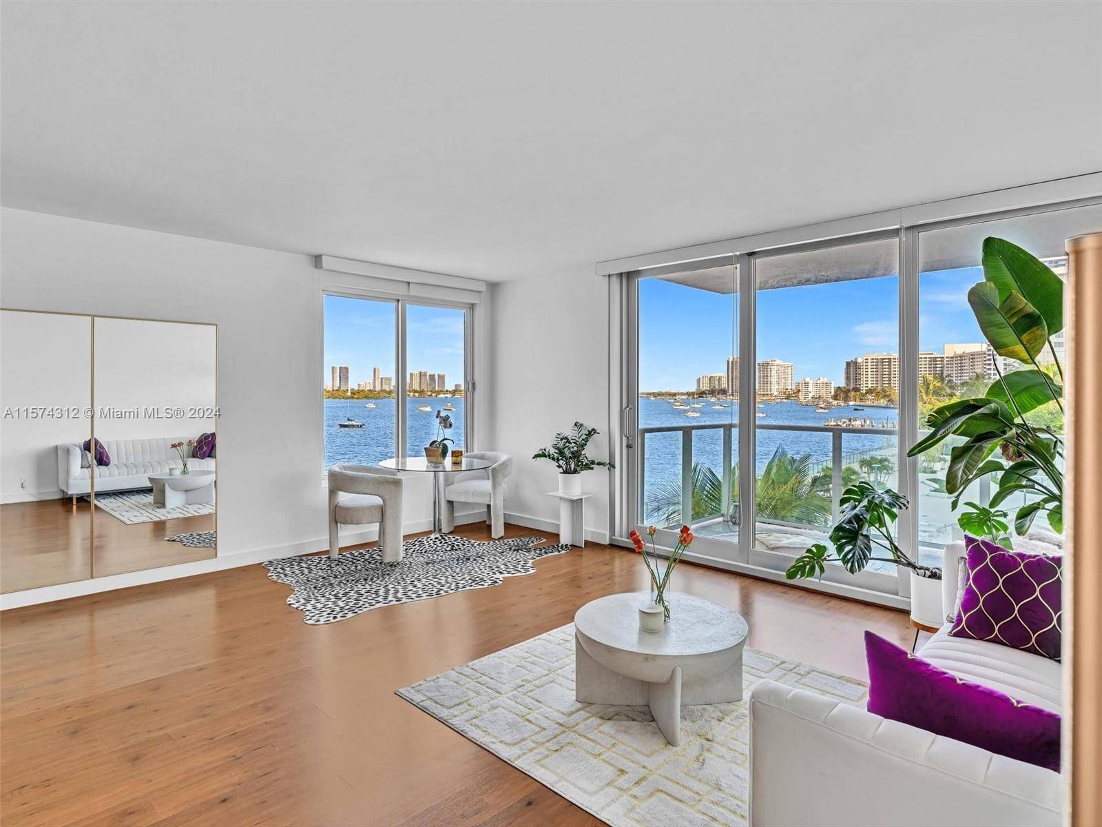 Enjoy Stunning Direct Bay Views the sunset from this immaculate corner unit at the luxurious Mirador 1000.
