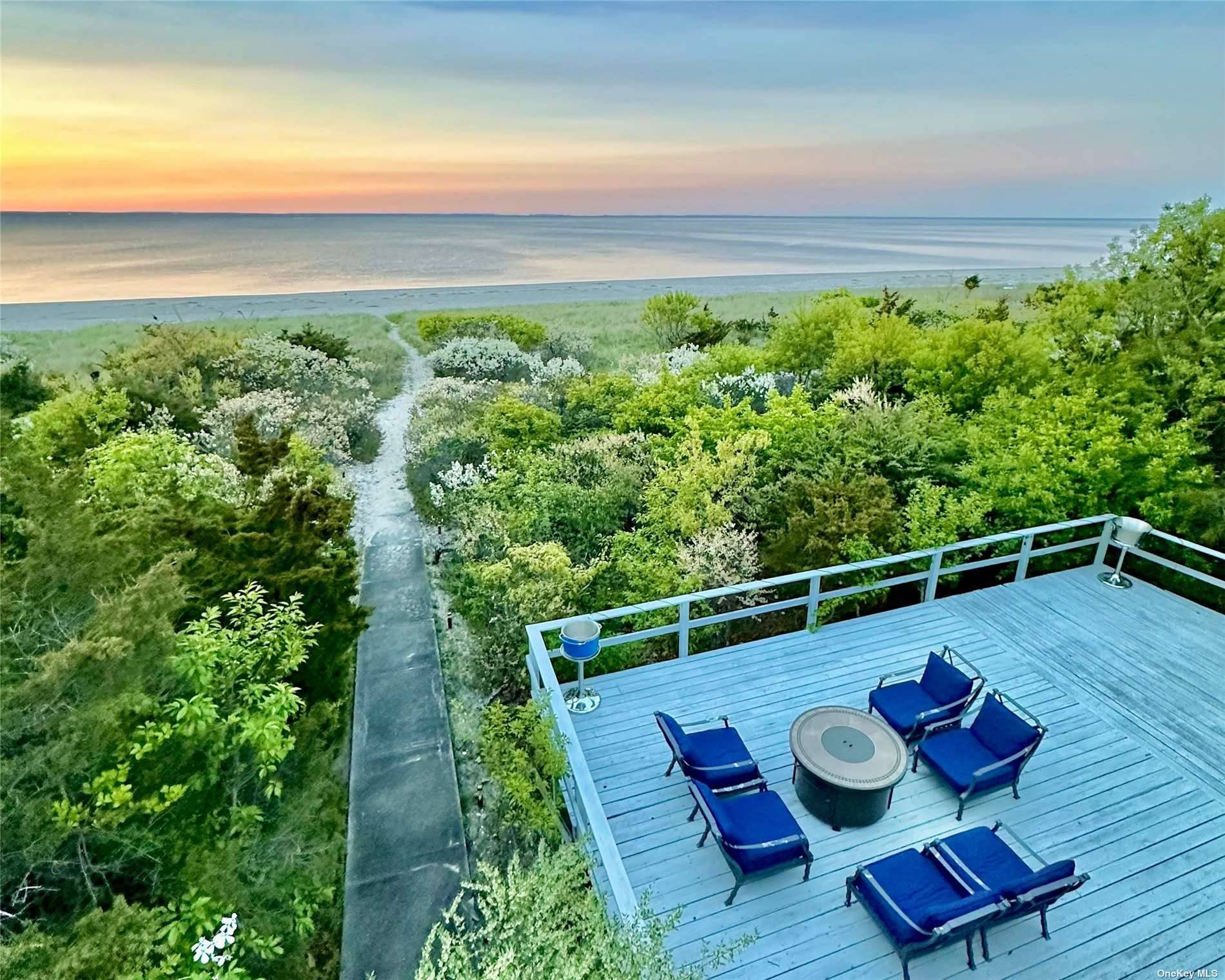 Welcome to this stunning entertainer's paradise located in the limited waterfront portion of Harbor Beach rd Mount Sinai.