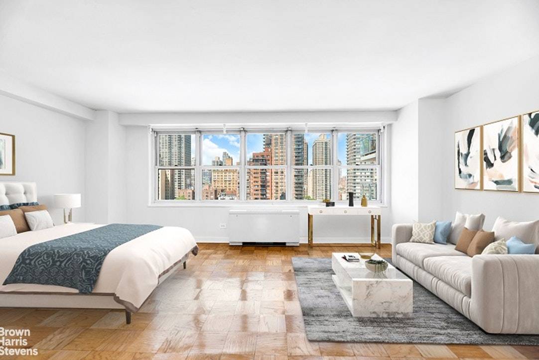 Fully renovated, sun blasted alcove studio with completely open expansive city views !