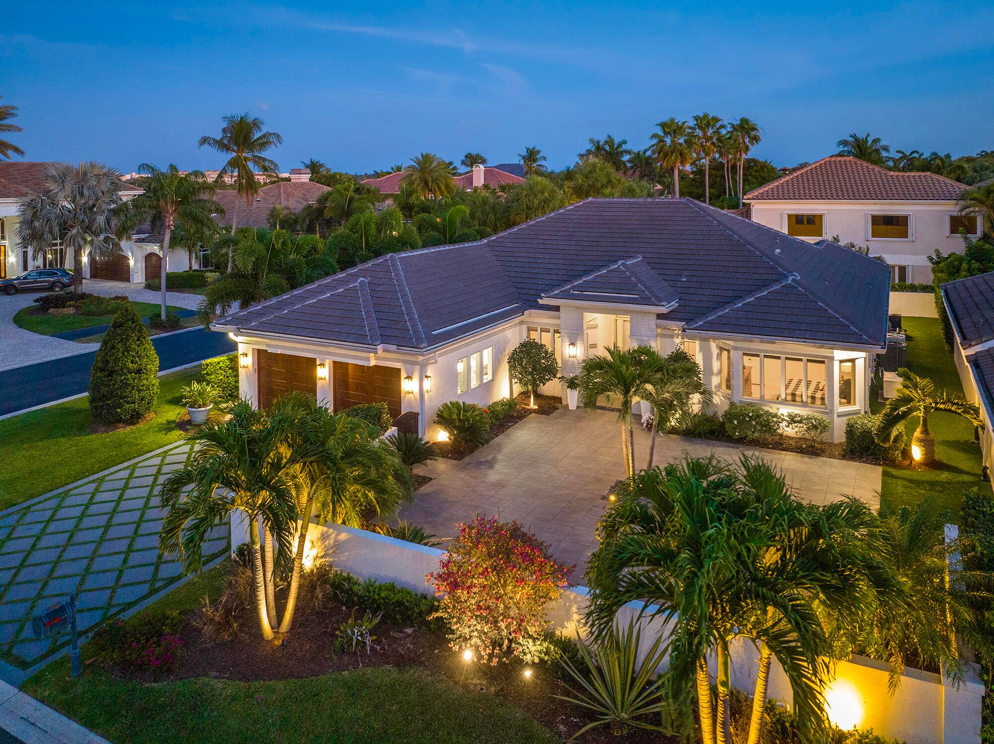 Immerse yourself in Luxury and a Lavish lifestyle within this Stunning, Fully renovated residence situated in the sought after Jonathan's Landing community of Casseekey Island in Jupiter, Florida.