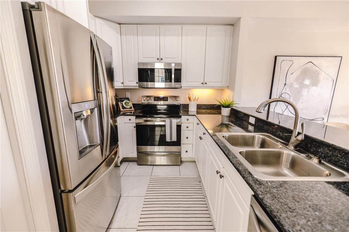 Bright, functional kitchen with open flow for entertaining.