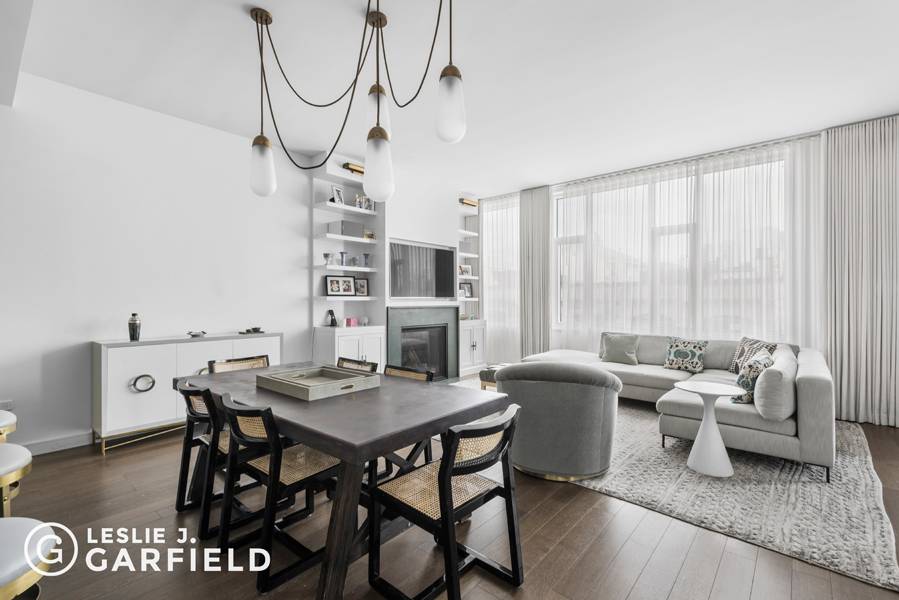 DEEDED PRIVATE PARKING SPOT AND STORAGE UNIT Penthouse G is a fully renovated, sun drenched duplex apartment with a private roof deck overlooking the downtown Brooklyn and Manhattan skylines.