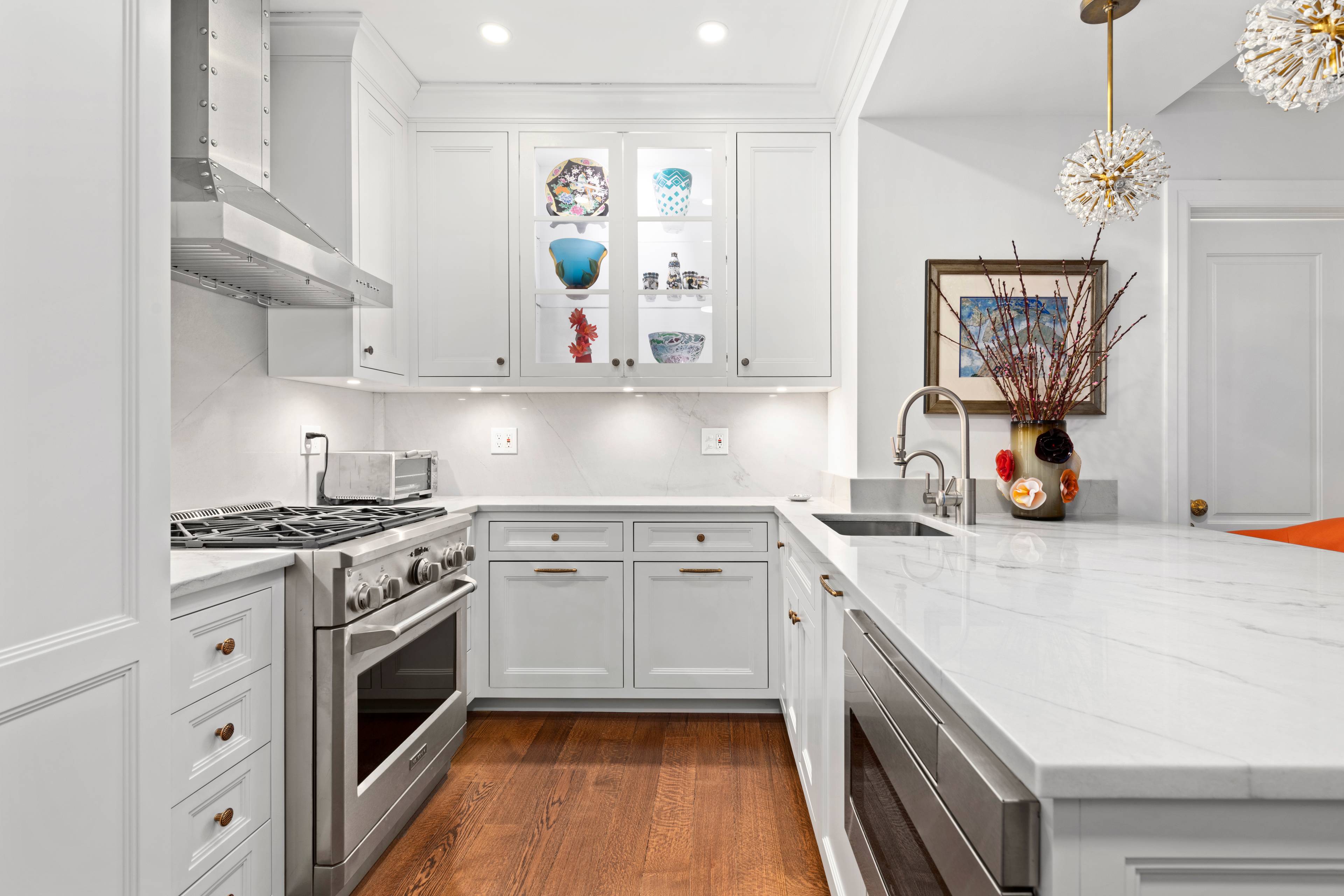 As you enter into this interior designer owned, recently renovated home you will immediately notice the incredibly high end finishes, natural light, and attention to detail.