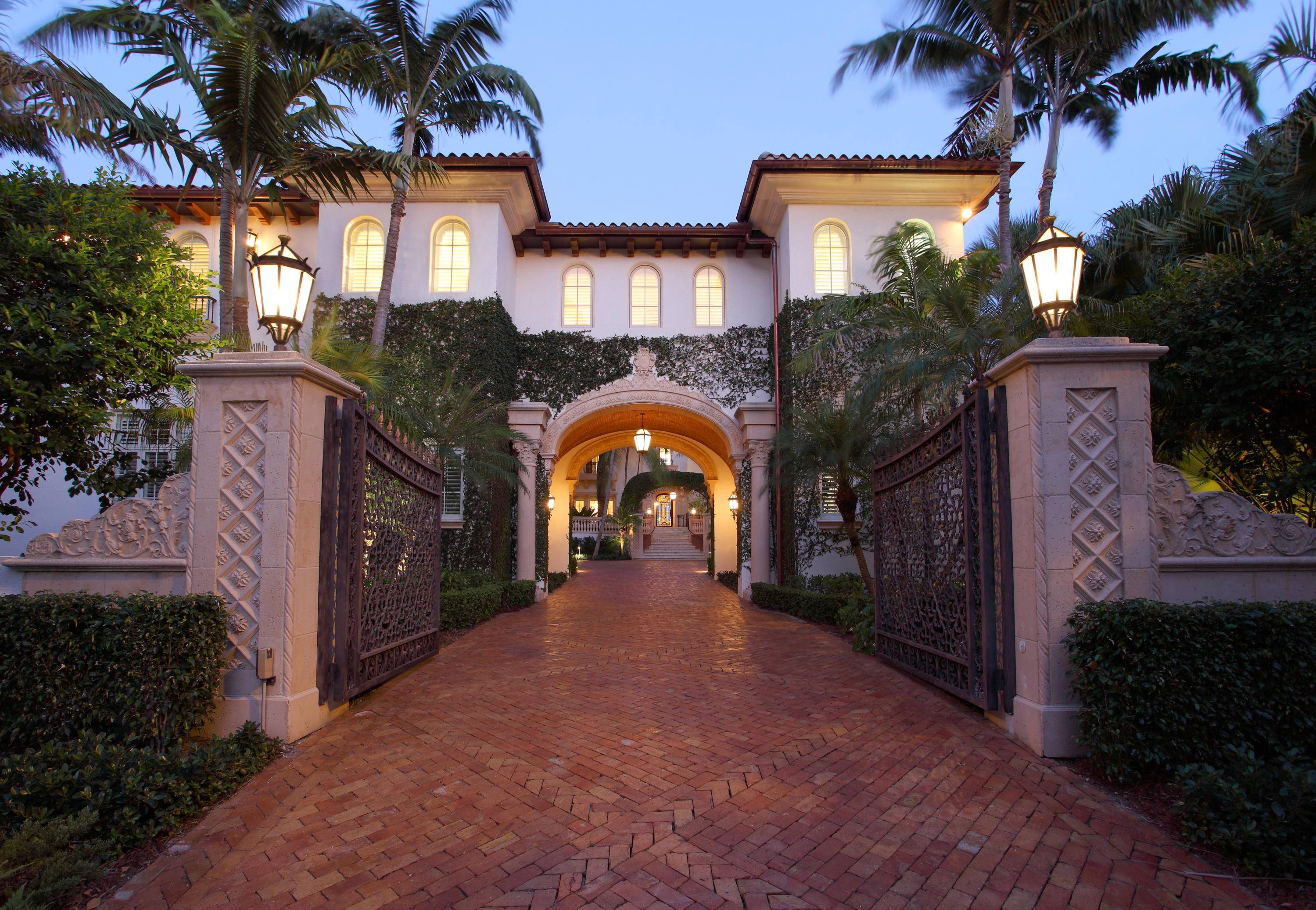 Major gated and walled Palm Beach inspired Oceanfront estate sited on.