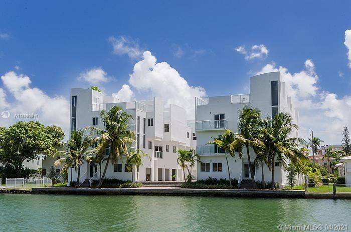 Ten water front townhomes in Miami Beach.