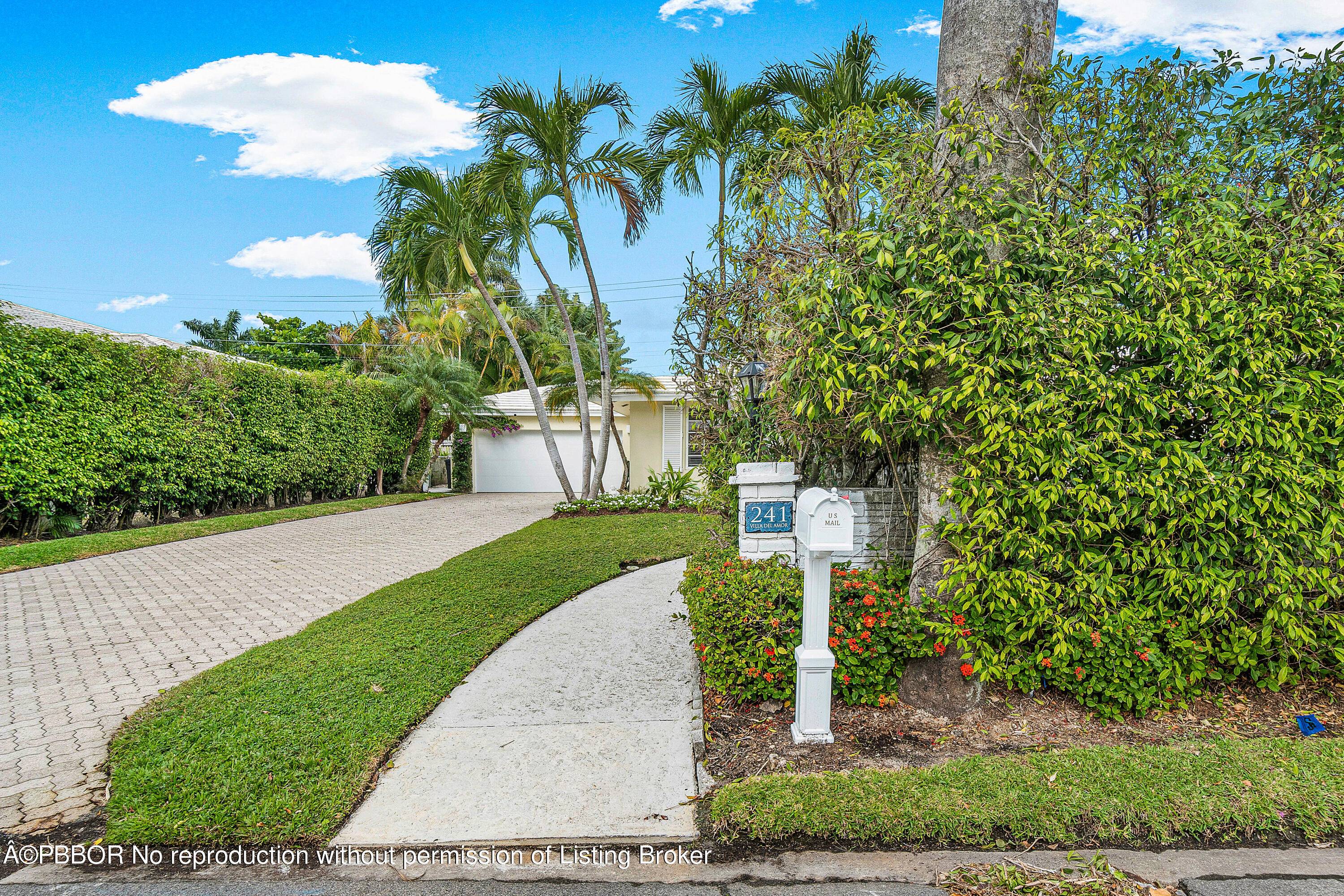 Exquisite Palm Beach Bermuda style single story home, Villa Del Amor on one of the most picturesque streets in the coveted North End available for annual, summer and seasonal rental.