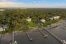Expansive waterfront estate with direct access to open water. Over a half-acre of backyard lawn - waterfront grounds with endless possibilities.