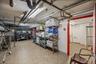 Unfinished below grade area featuring light tile patterned floors