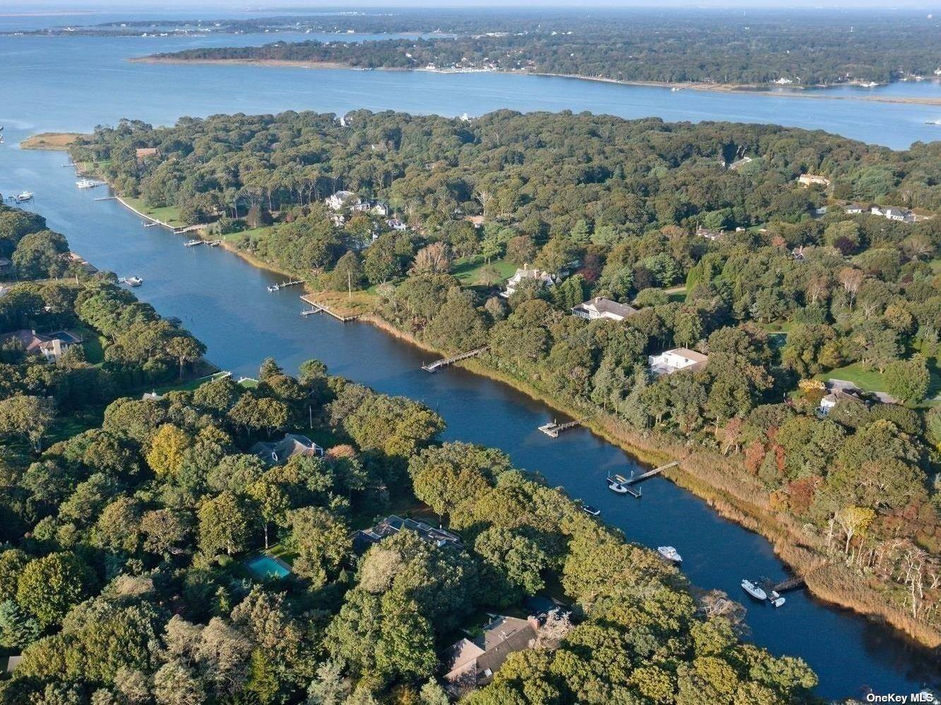 This waterfront home is situated on Fish Creek with access to Moriches Bay.