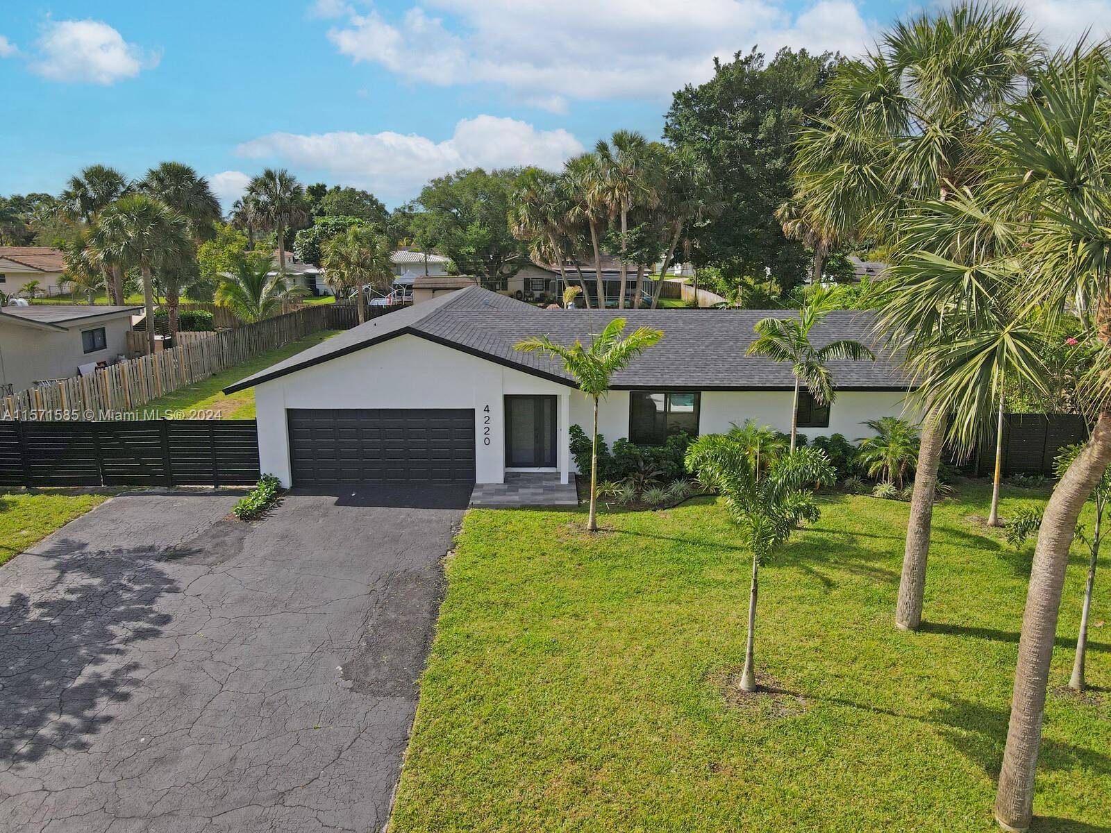 One Story Pool Home, in Plantation Country Club Estates, 4 Bedroom 2 Bathroom Den Office Space, 2 Car Garage and Pool Wood Fenced Private Backyard Newly Resurfaced Pool and New ...