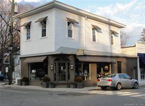 The TIMES SQUARE building as you enter the head of Main St in Historic Essex Village.