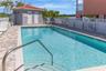 Relax at your quaint communities private pool oasis.