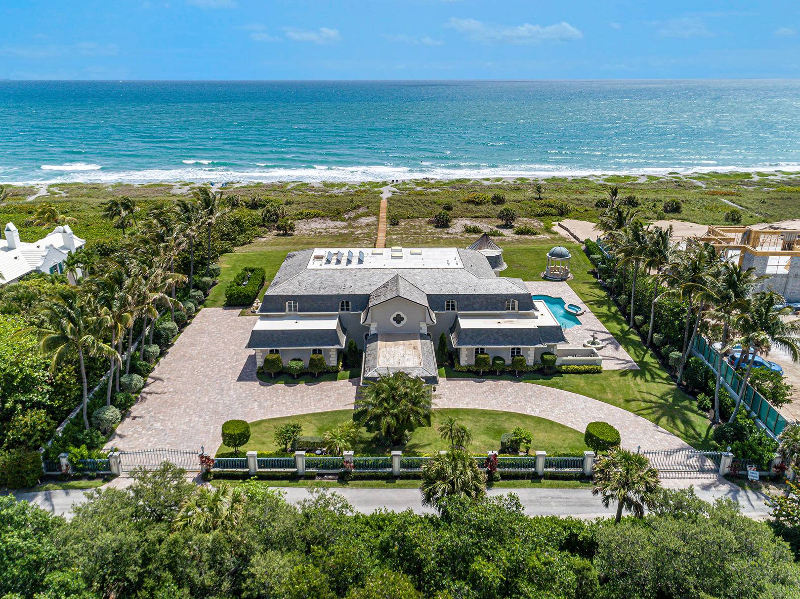Gorgeous direct oceanfront estate located on the southern end of Jupiter Island.