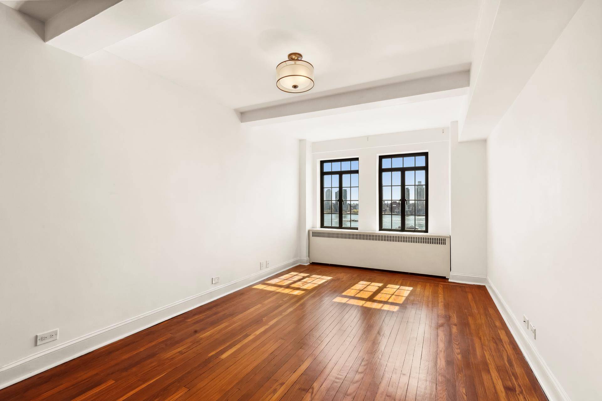 Elevate your urban lifestyle with this elegant one bedroom residence in the heart of Tudor City, nestled within a prestigious coop building boasting a 24 hour doorman and modern amenities.