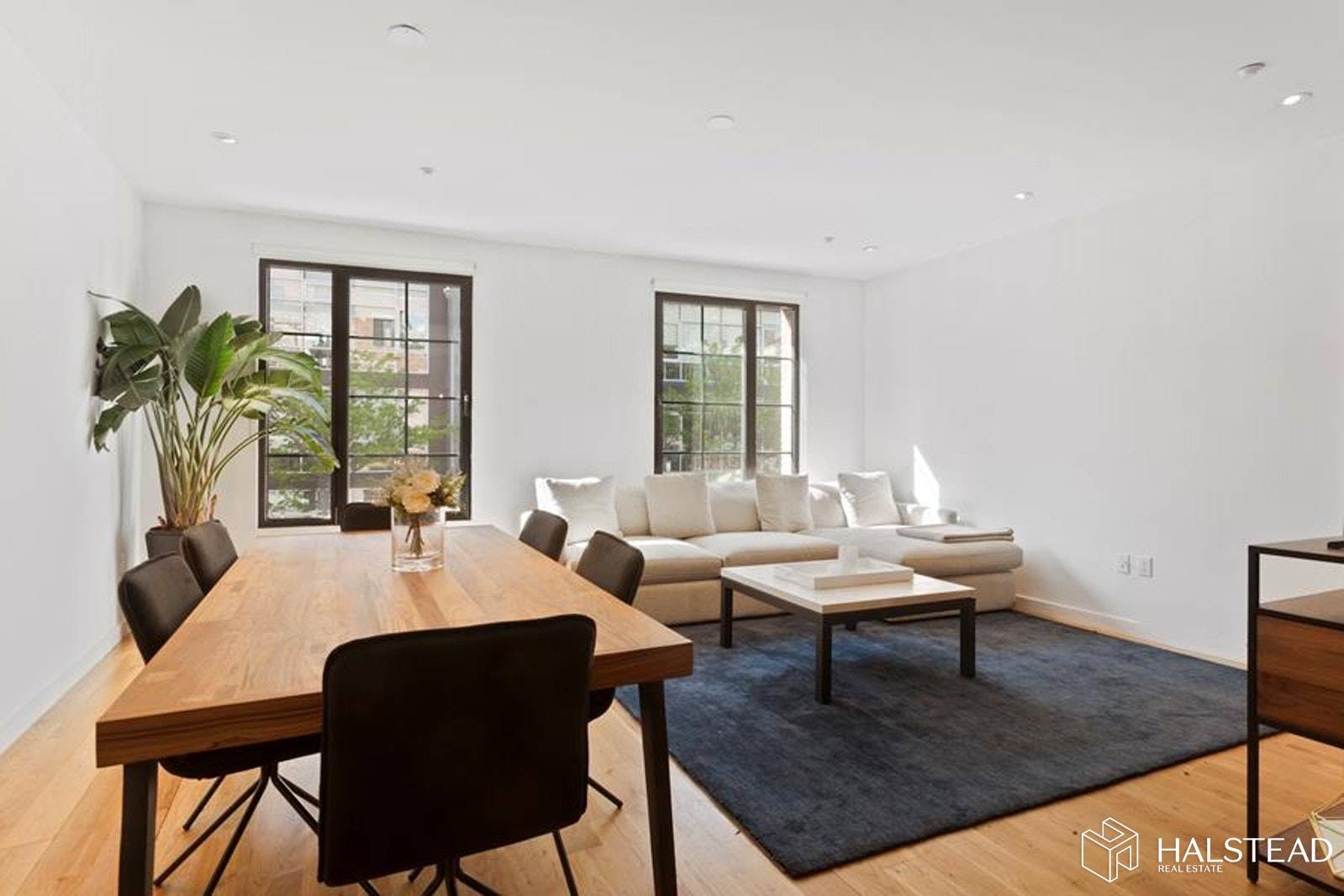 A stone's throw from waterfront Domino Park, this 2 bedroom, 2 bathroom home incorporates Williamsburg's coveted warehouse aesthetic with loft like layout, oversized windows and brick facade.