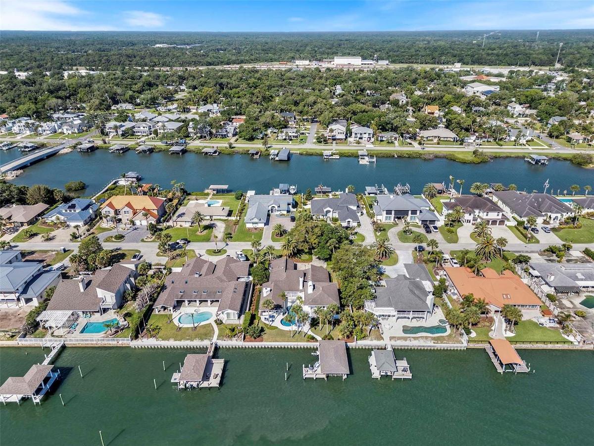 Facing East, 1215 Commodore Dr. enjoys deep water and direct Intracoastal Frontage.