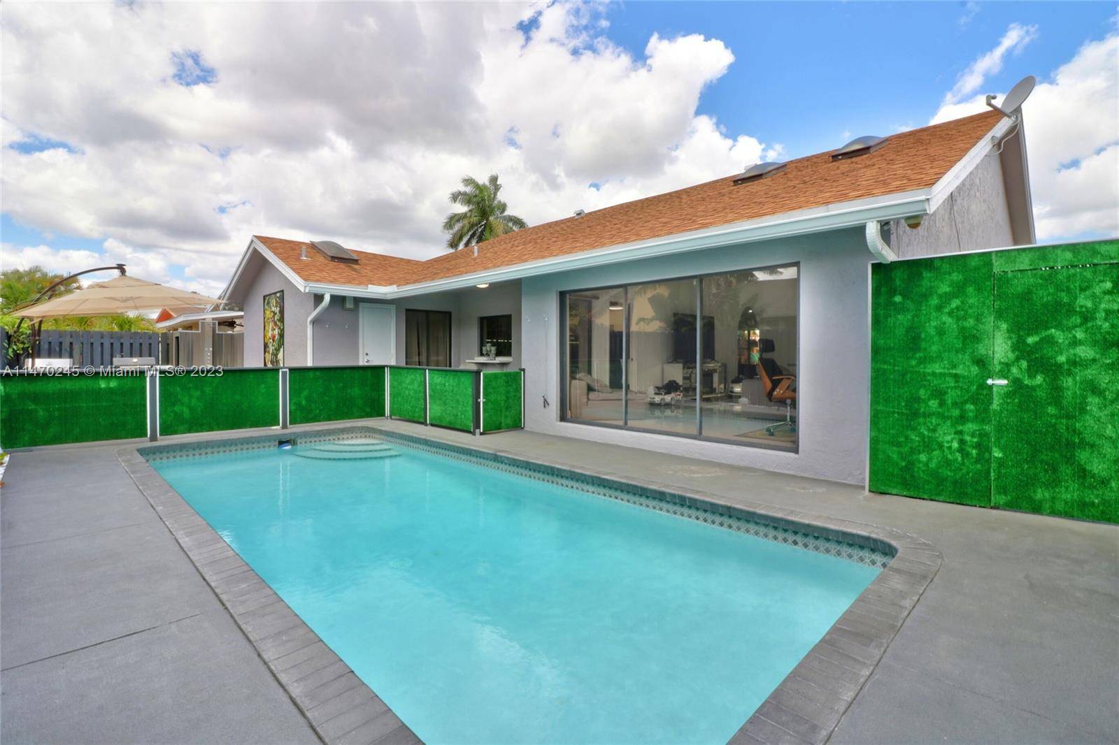 COMPLETELY REMODELED, BEAUTIFULLY FURNISHED, SPACIOUS 3 2 HOUSE WITH THE HEATED SWIMMING POOL.