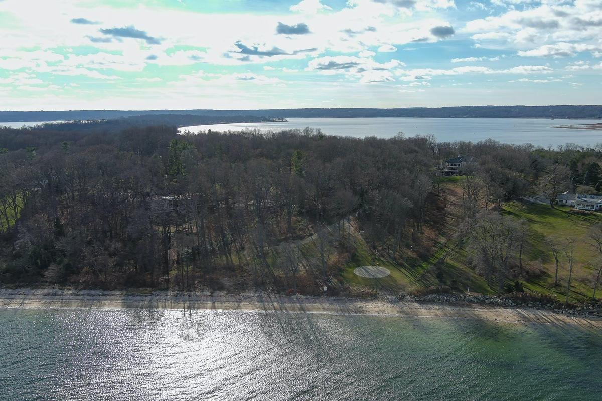 Water view featuring a forest