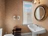 Windows in the half bath for natural lighting