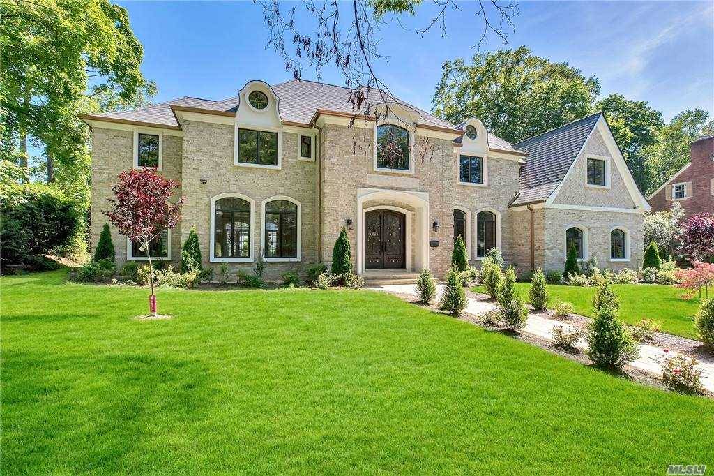 Brand new stately all brick center hall colonial located in the heart of the prestigious Village of Kensington, with its own private police and pool club.