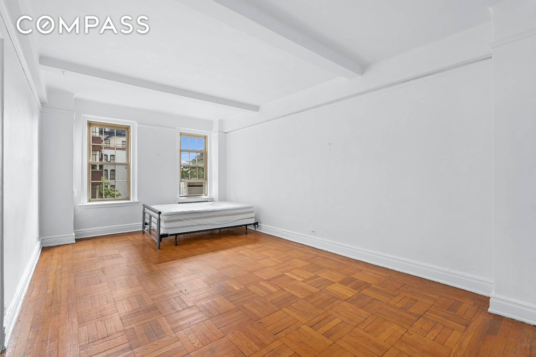 Spacious, sunny studio apartment in New York City's premier cooperative, 24 Fifth Avenue in the heart of Greenwich Village !