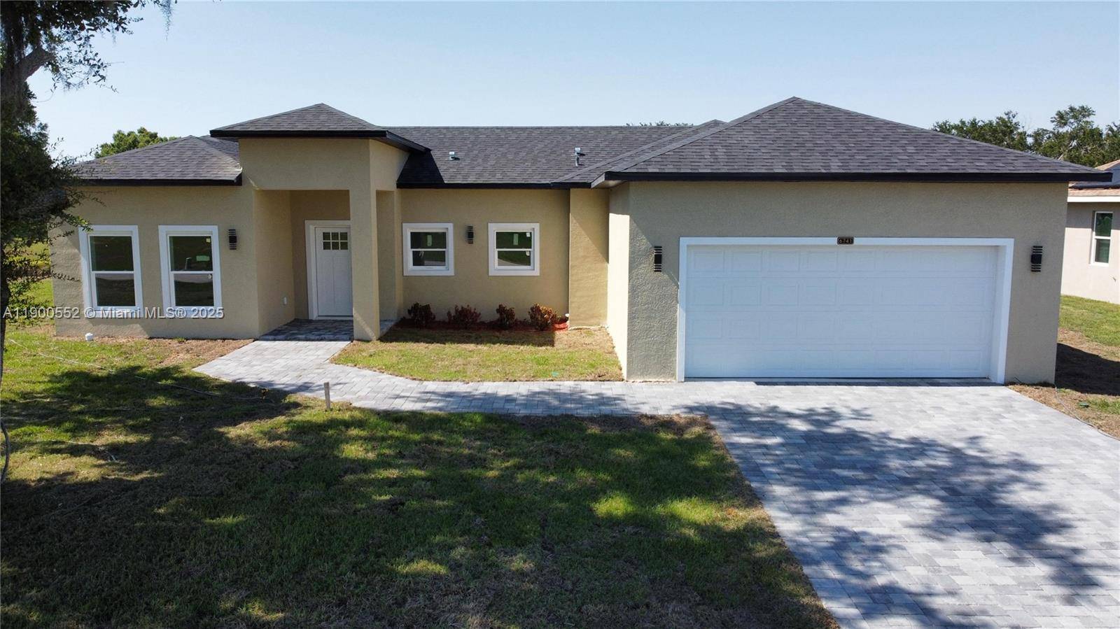 Welcome to this exceptional new construction home, perfectly positioned on a premium lot with a tranquil water view at the rear.