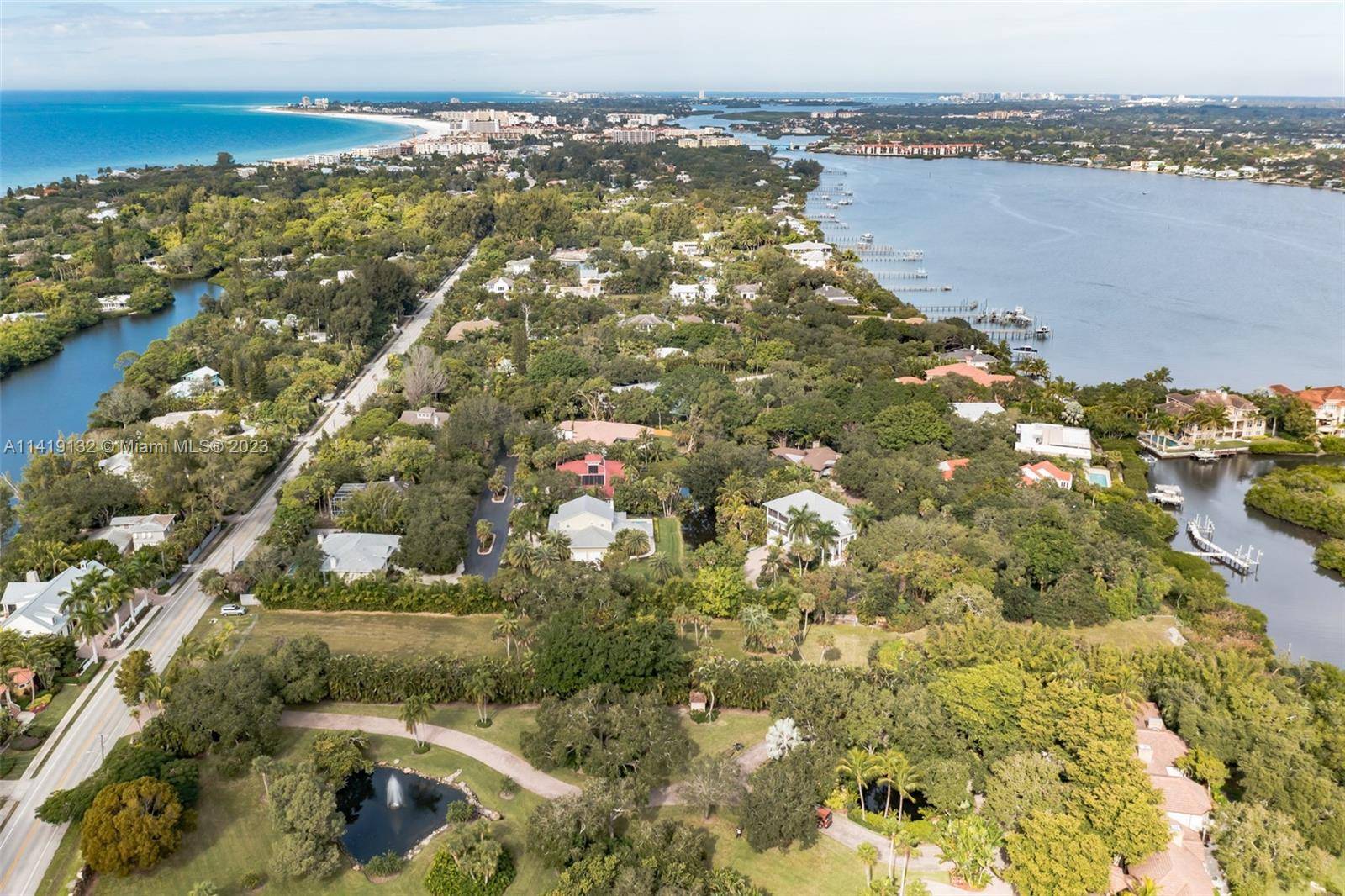 Two acre Lot on Little Sarasota Bay with exceptional privacy, views, boating access and development potential.