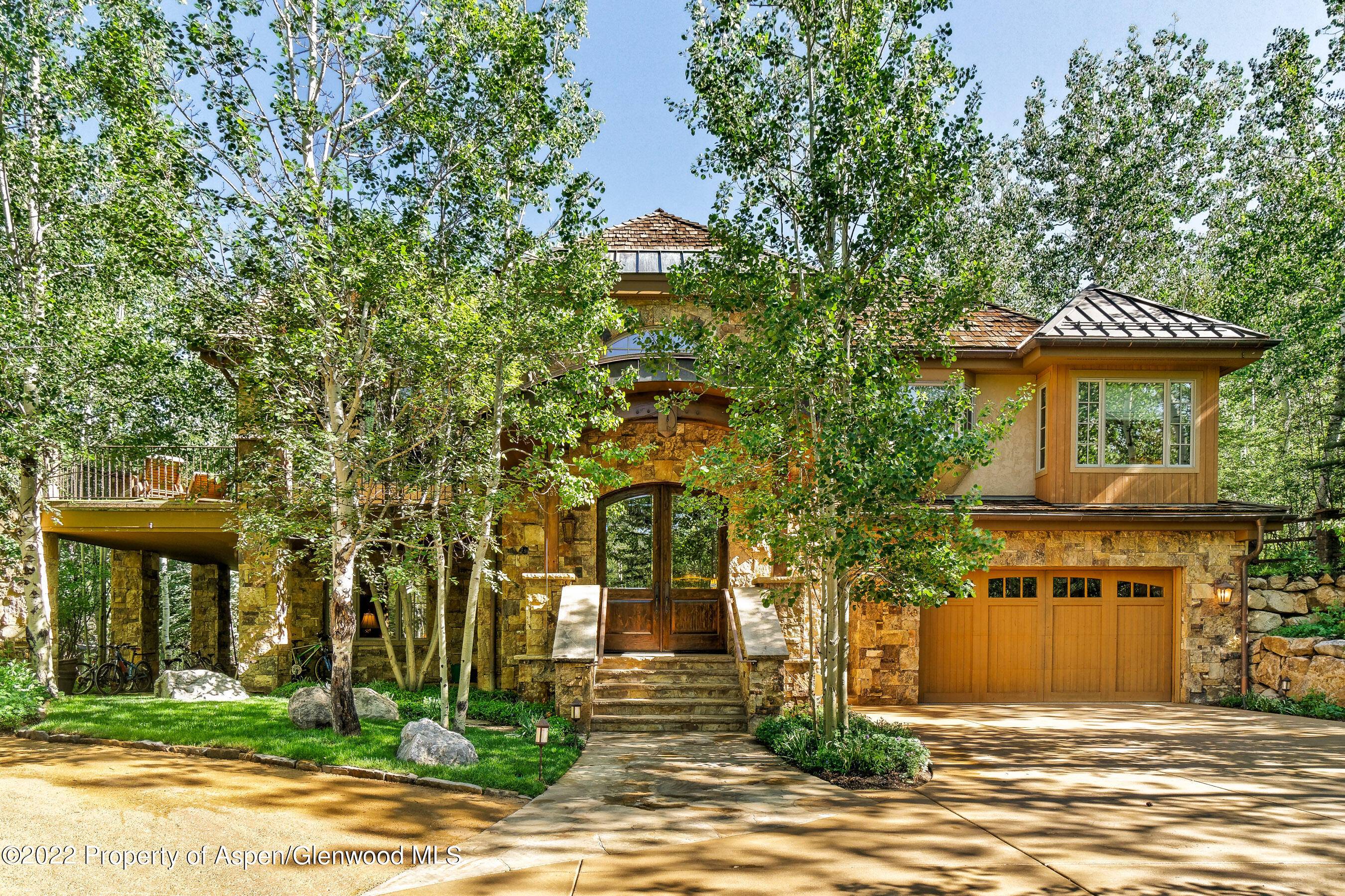 Located on the east side of Aspen on a quiet street on a large, flat, treed lot just one mile to town.