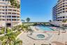 Grand Bay Swimming Pool Area and Barbecue. New Patio Furniture, Lounge Chairs, Sofa's, Umbrellas and Barbecue Area