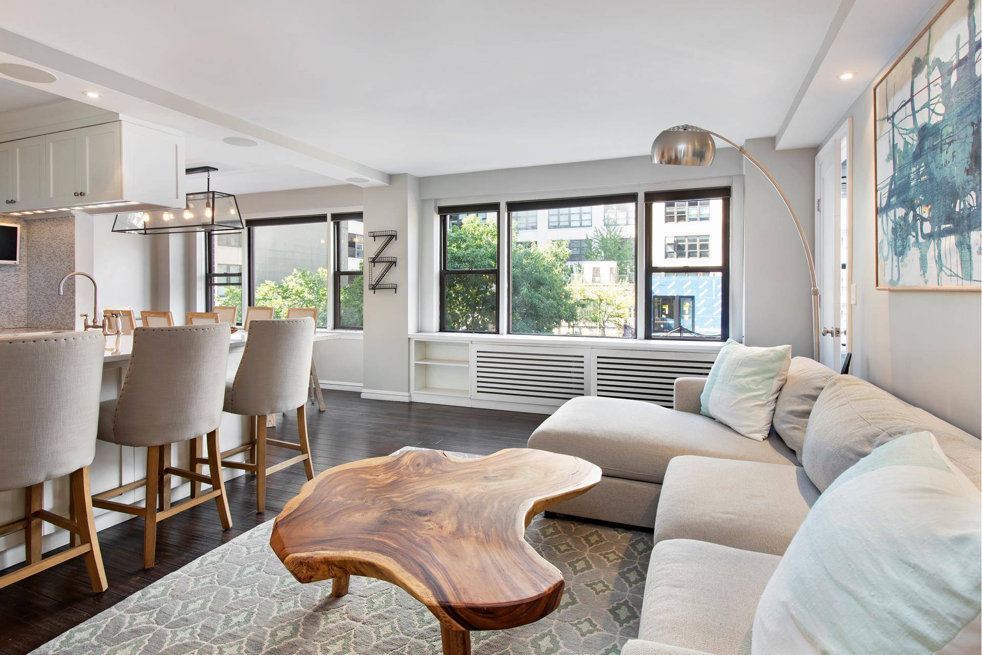 Residence 6F at 50 King Street is a beautifully renovated three bedroom, two bathroom home in Hudson Square.