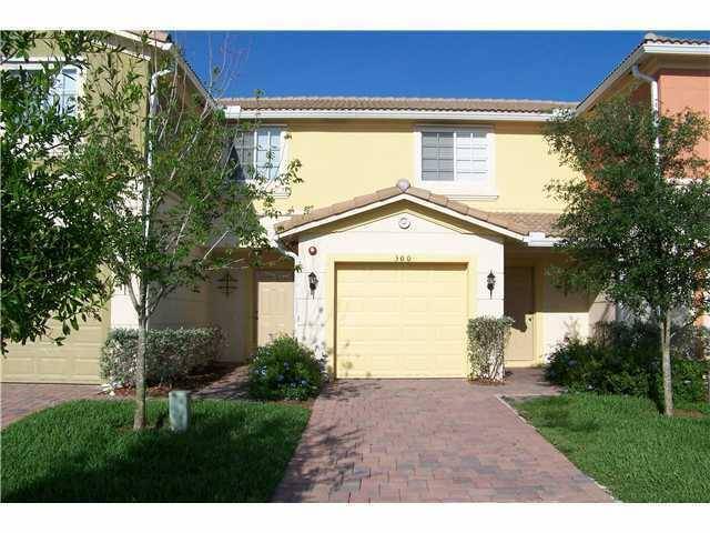 LOVELY 2 STORY TOWNHOUSE WITH ALL CERAMIC TILED FLOORS ON 1ST FLOOR, CARPET UPSTAIRS.
