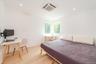 Bedroom with light wood-style floors, cooling unit, and recessed lighting