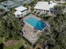 The Waterford Sports Club pool is junior olympic sized and includes a heated spa with plenty of seating for everyone
