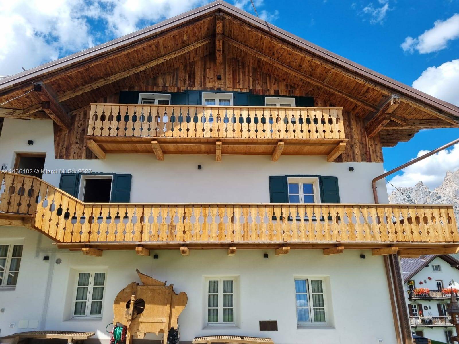 This exquisite penthouse residence, located in Cortina d Ampezzo, Italy, with breathtaking views of the Dolomites is truly a gem !